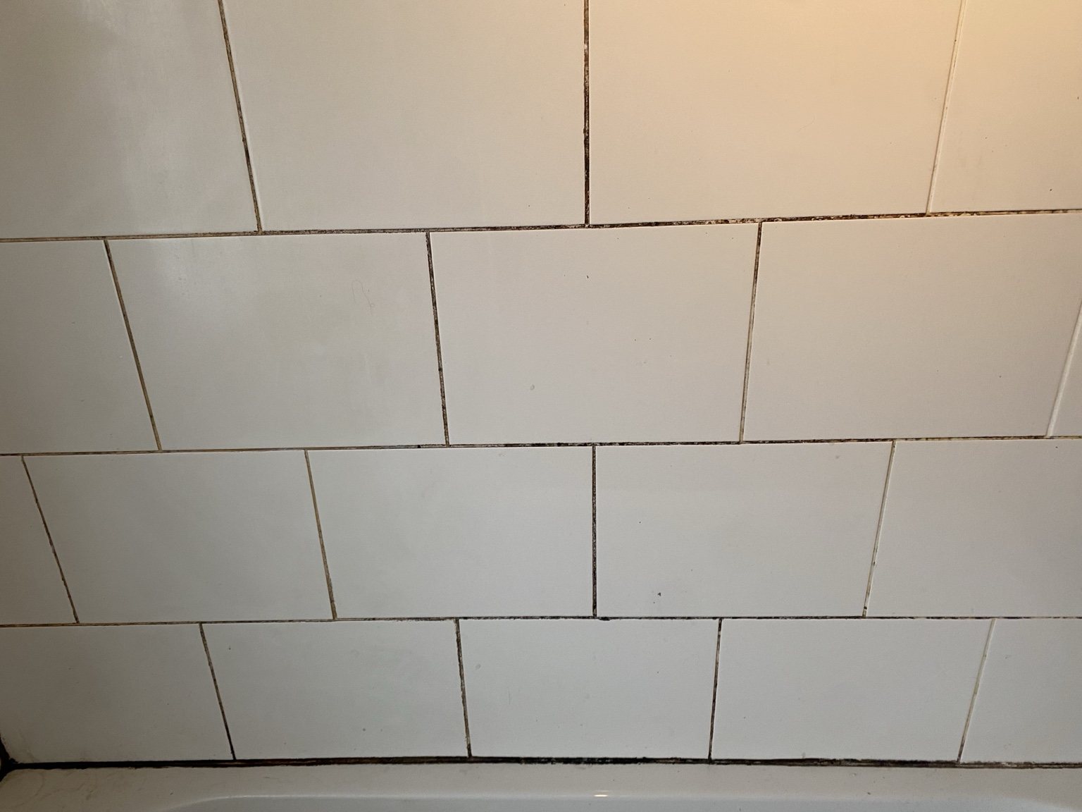 Tiles before grout refresh
